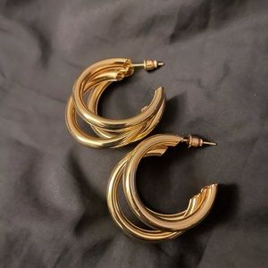 Gold colored hoop earrings. New